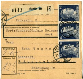 1943, 21.Sep., Paketkte. m. MiF. BERLIN W50 c(Handstpl.) nach Rostock. Porto: RM 2.45.